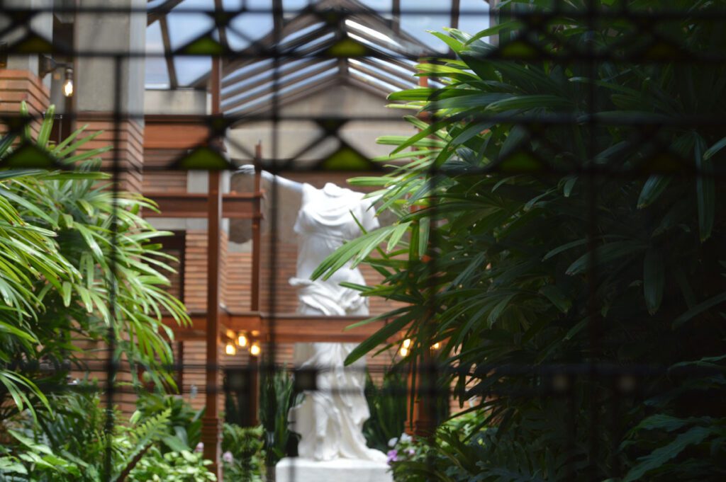 nike-though-leaves Statue of Nike