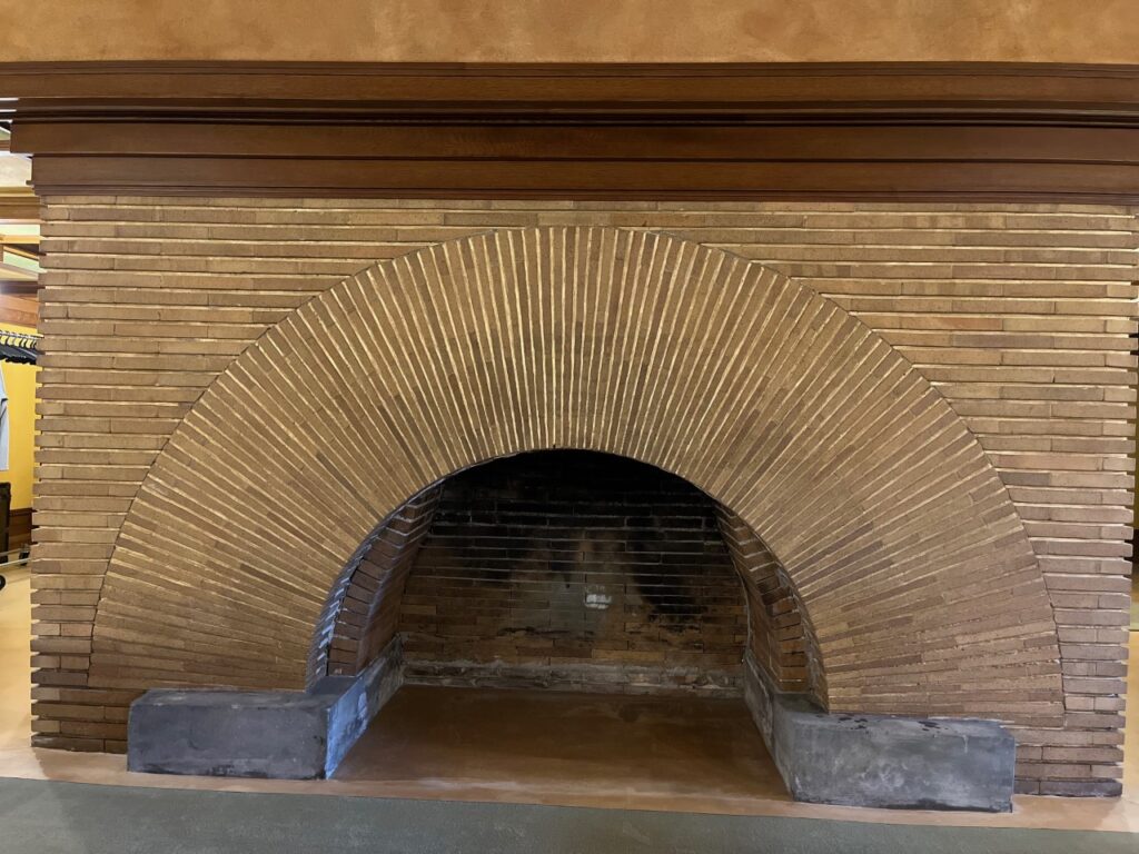 sunburst fireplace in lower level