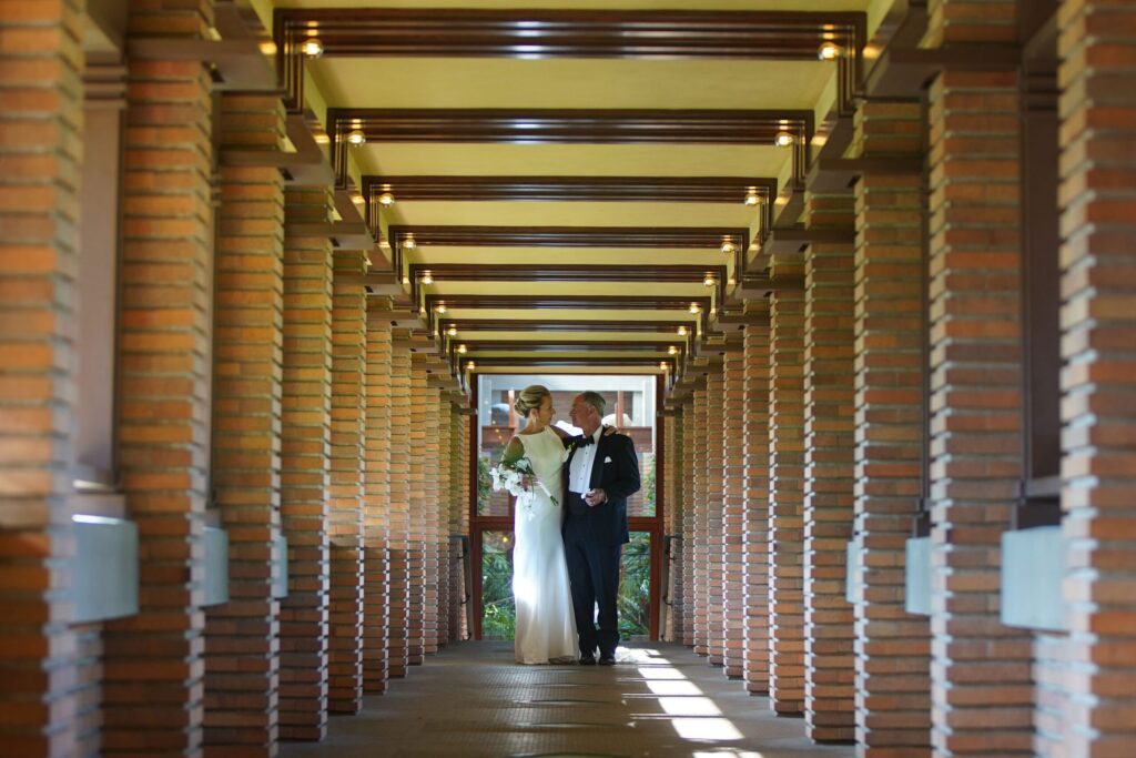 wedding couple on pergola credit Mark Mulville